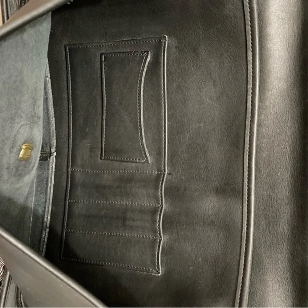Coach black leather metropolitan briefcase bag 5180 as seen on Ann Hathaway